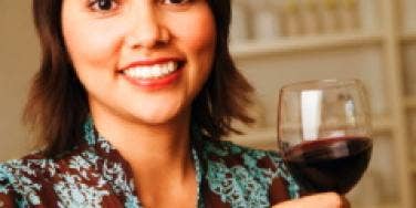 Woman with a glass of wine