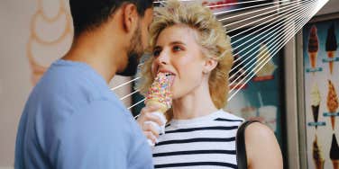 woman licking ice cream cone 