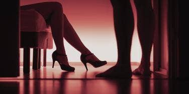 high heels with red lighting background