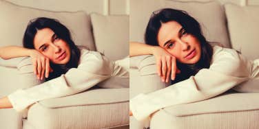 Woman lying on sofa enjoying time alone