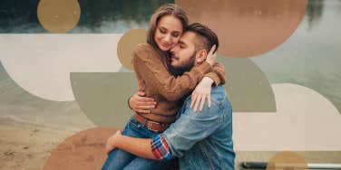 Couple hugging by the lake