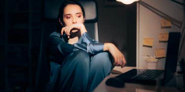 sad woman sitting in the dark