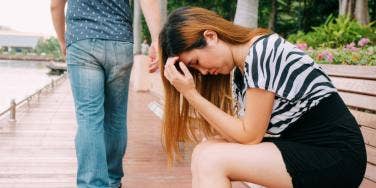 man leaving sad woman