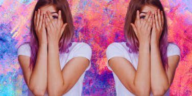 woman with hands over face