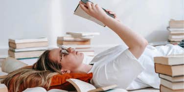 woman in glasses reading 