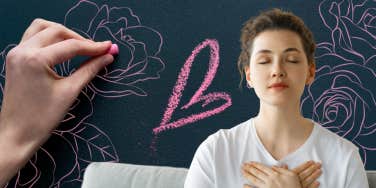 Woman with hands over heart 