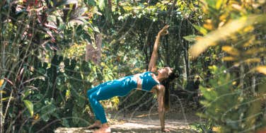 Author doing yoga in amazon forest