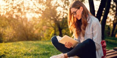 woman reading outdoors