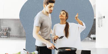 Woman cooking healthy dish for her partner 