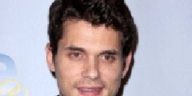 John Mayer begs for kisses at LA nightclub