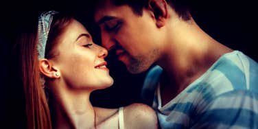 couple in love touching foreheads