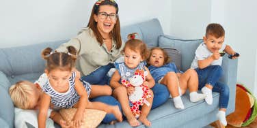 woman with kids on the couch