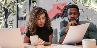 husband and wife looking at paperwork together