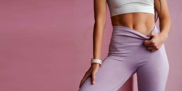 woman showing stomach