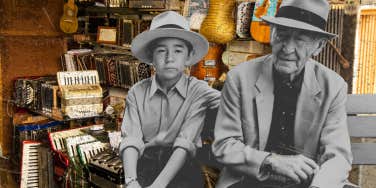 Generational photo, father and son on bench in front of antiques