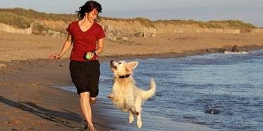 woman running with a dog