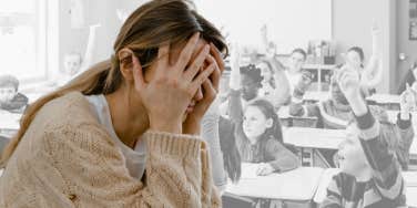 Teacher looking overwhelmed in her classroom. 