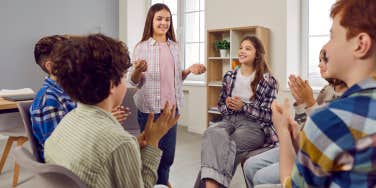 group of students sitting in circle