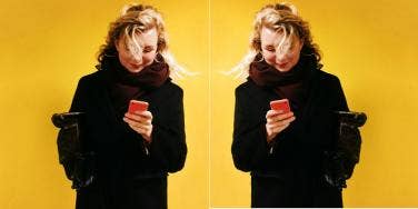 woman looking at phone