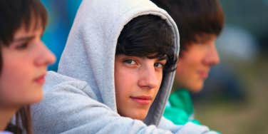teenager wearing a hoodie