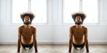 Man in yoga pose re-centering himself 