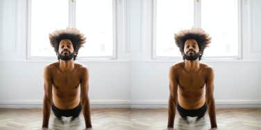 Man in yoga pose re-centering himself 