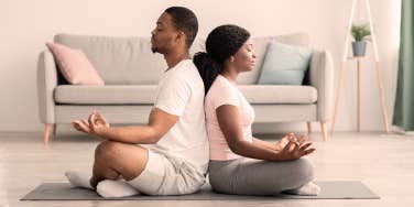 couple meditating together