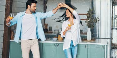 Couple dancing in their kitchen 