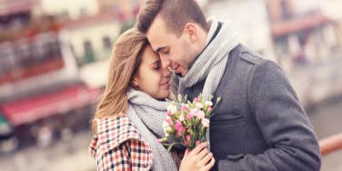 happy couple with flowers