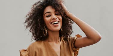 strong woman with curly hair