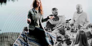 Woman sitting on a grey rock 