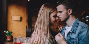 woman and man embracing