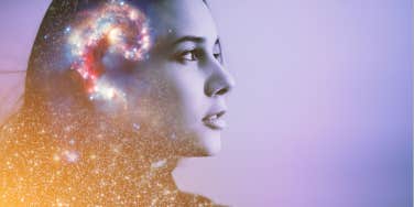 woman connects with the universe