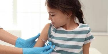 girl getting vaccine