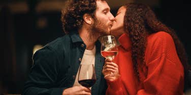 couple kissing on romantic date 