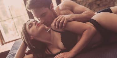 couples kissing in bed