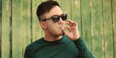 man smoking marijuana