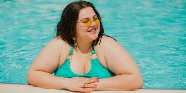 plus size woman in pool 