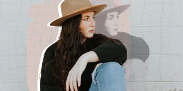 Woman sitting down looking out