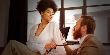 woman flirting with man at work