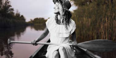 Woman happy on boat 