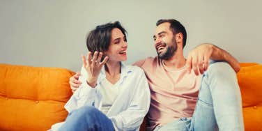 couple sitting together talking about a compromise