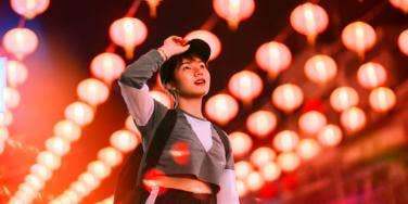 asian person under bright red lighting