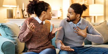 couple arguing on couch