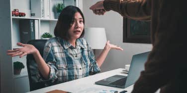 employee being reprimanded by boss