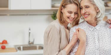 daughter embracing mom