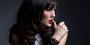 woman dark background