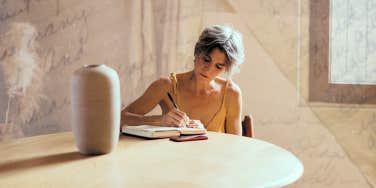 Woman journaling post divorce 