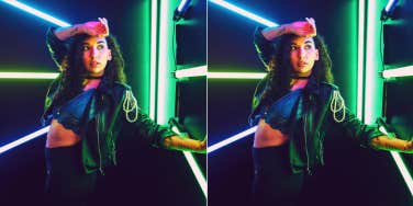 woman posing with neon lights