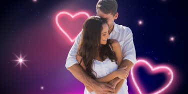 man holding woman snuggling 